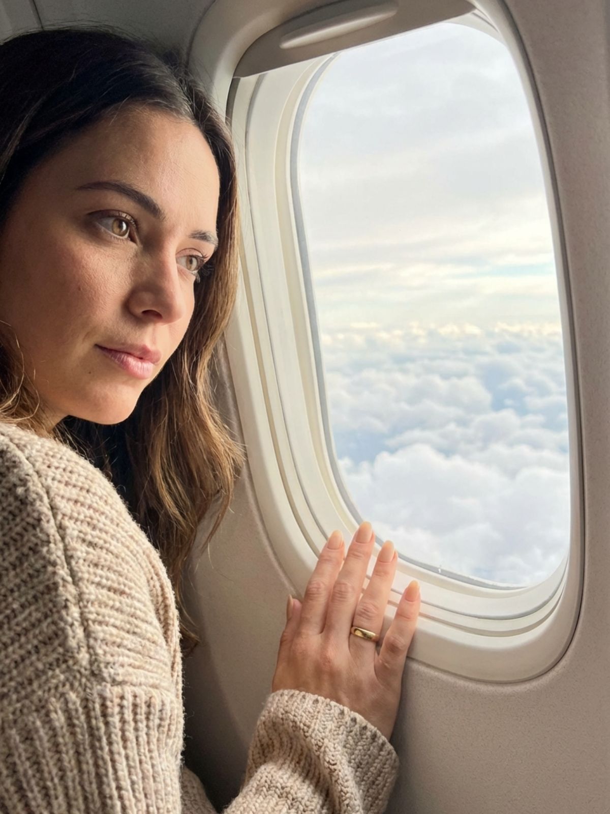 airplane window manicure shot Press-On Nails for Travel and Vacation - Arrive at your destination with confidence and a perfectly polished set.