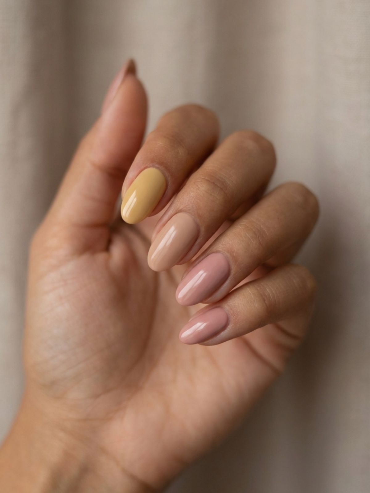 Press-On Nails vs Acrylic Nails - Selecting the correct nude undertone prevents the 'fake' appearance often associated with artificial nails.