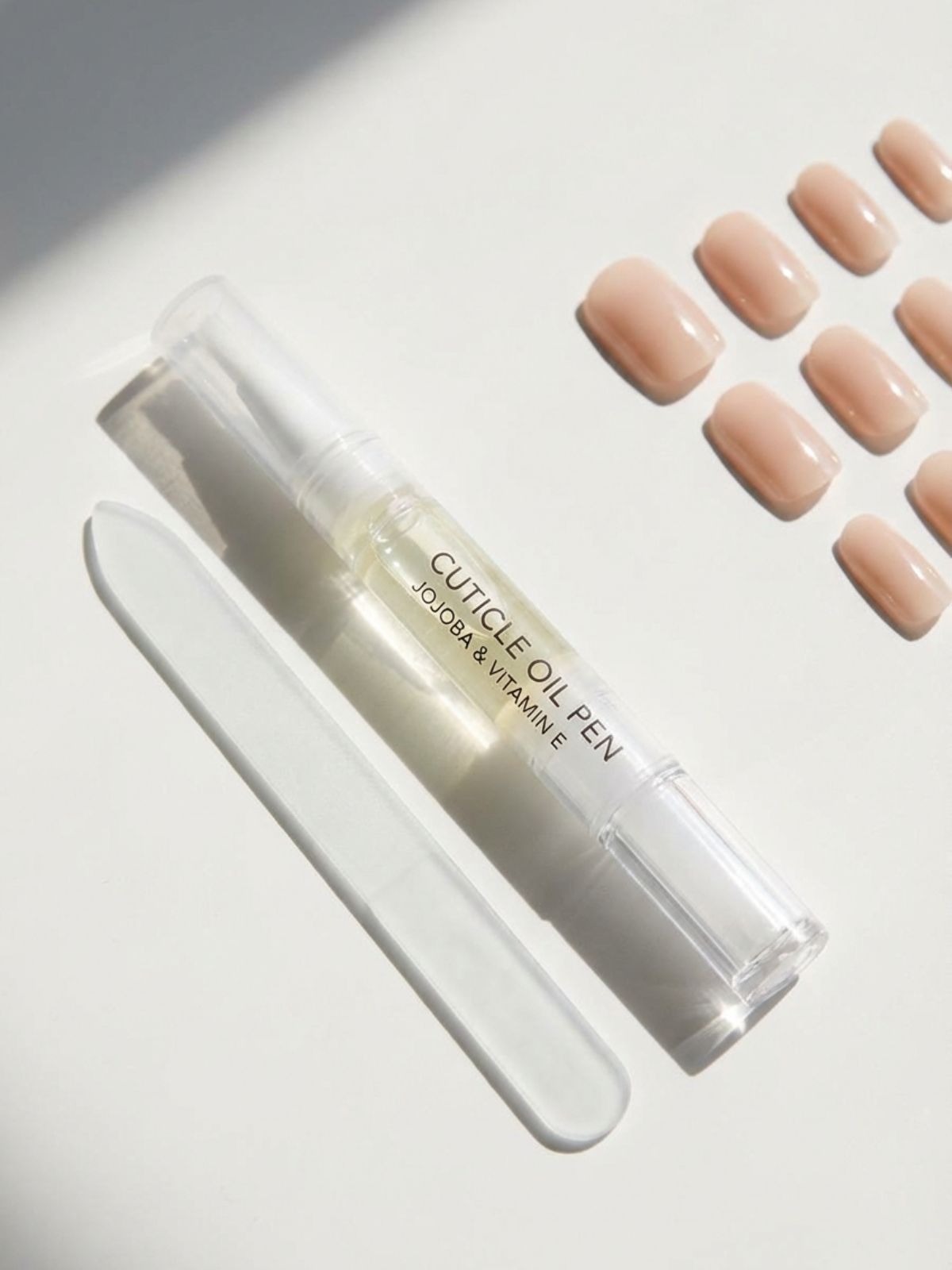 nail care travel kit Press-On Nails for Travel and Vacation - Don't forget your cuticle oil to keep your minimal manicure looking fresh after a flight.