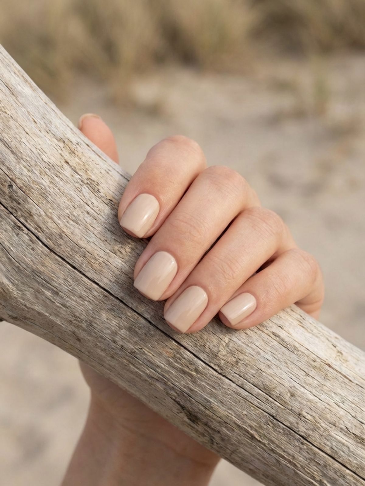 Minimal Nails for Beach Vacation - Opaque linen beige nails provide a modern, architectural look that pairs with everything.